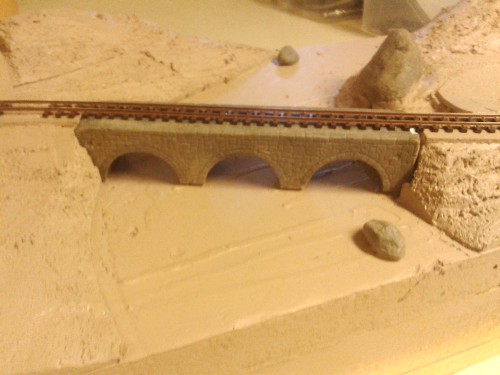 Track laid on the stone bridge (plaster)